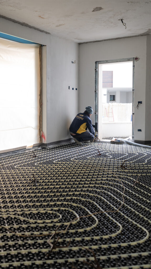Preparazione cantiere per posa massetto per impianto radiante